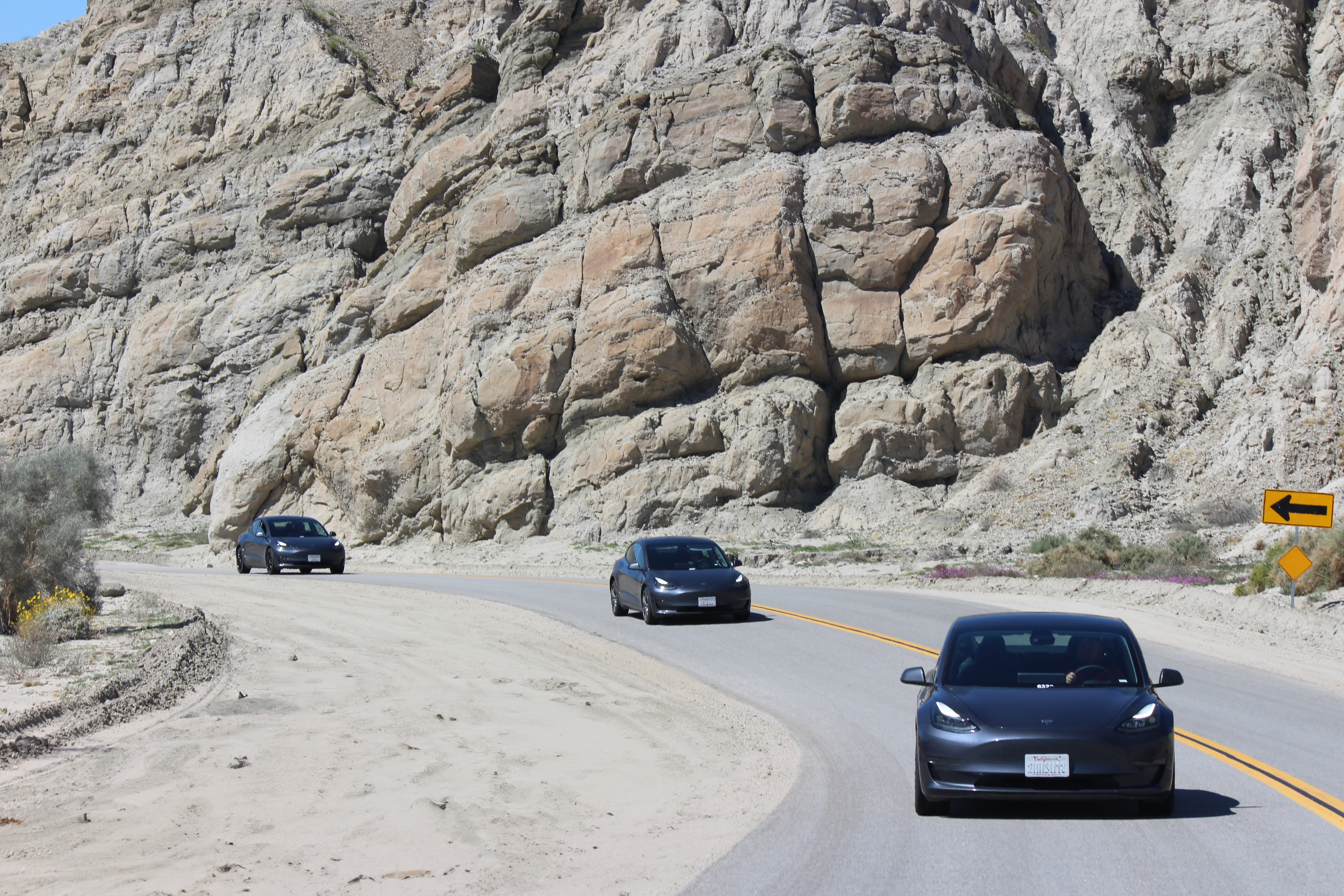 Electric vehicle tire testing on varied road terrain